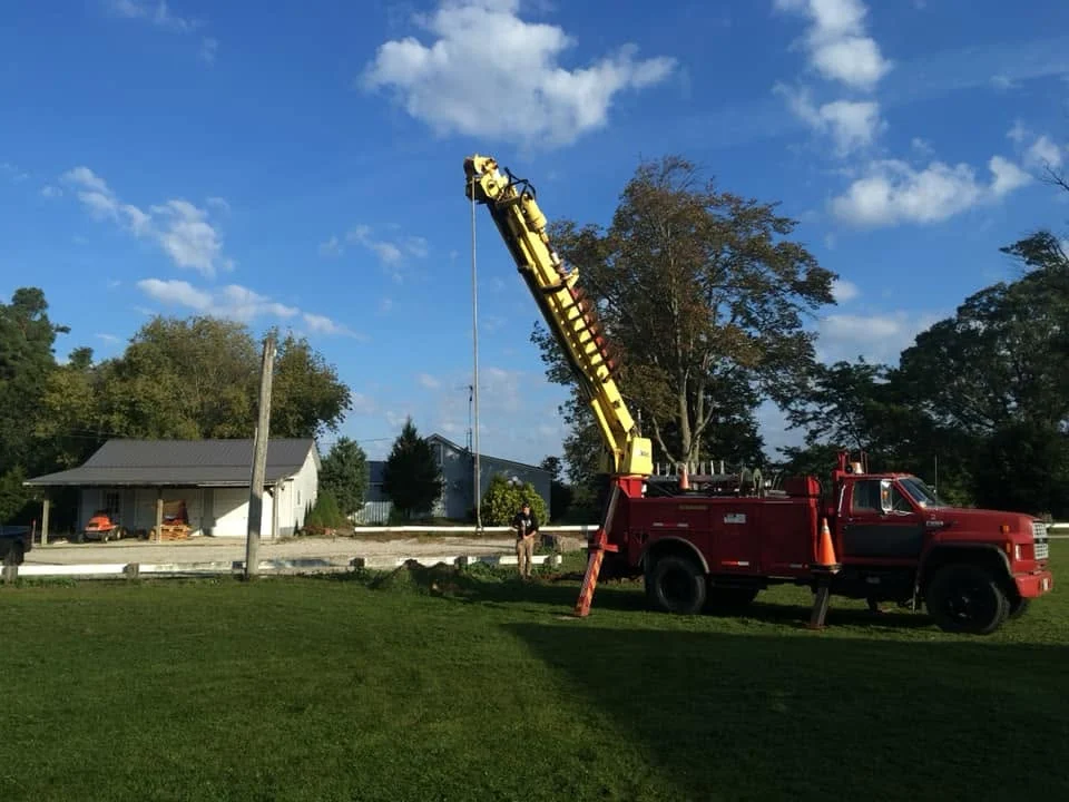 Speedy Electric licensed electrician completing pole line installation for a farm property in Oxford County